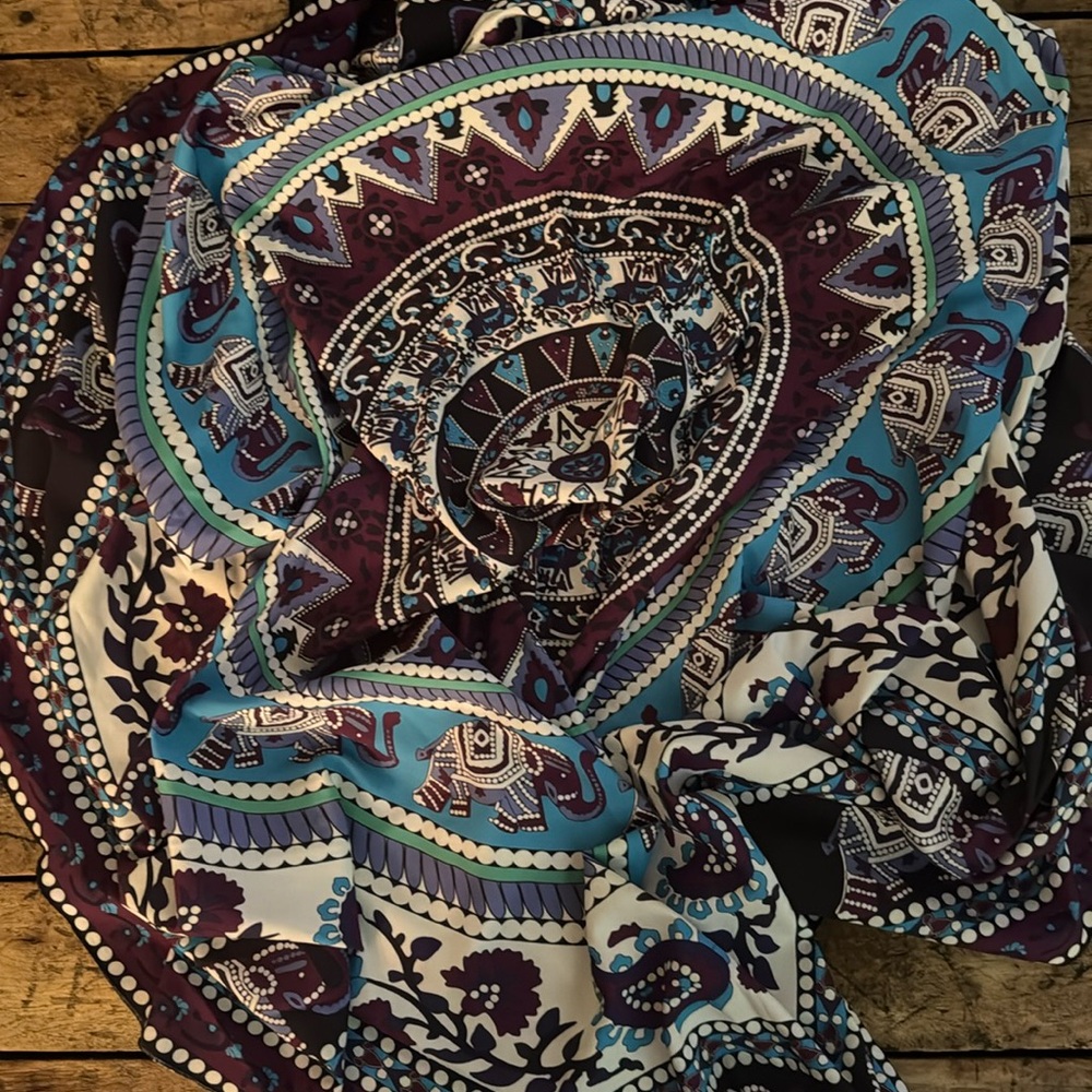 Beach cover ….. beach blanket.
